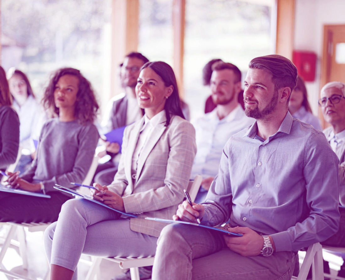 Students engaged in collaborative learning using digital devices