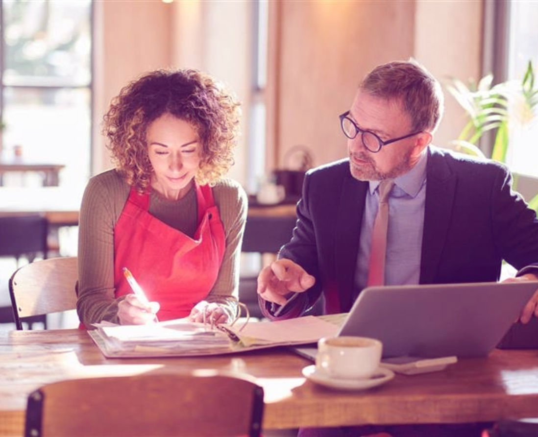 Owner overseeing operations in a warehouse setting